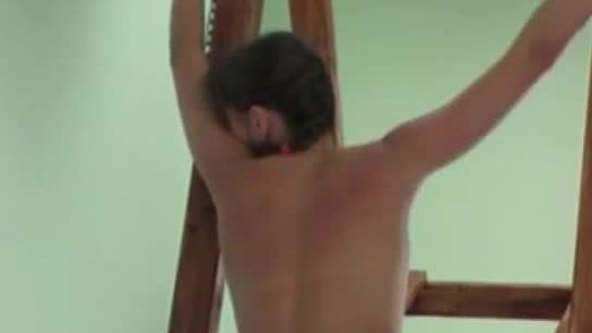 Brunette squirms while spanked